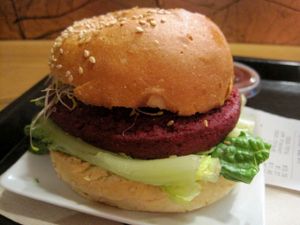 COPPER BURGER. Beet, lentils, organic brown rice, maple syrup, Dijon vegenaise, organic miso, caramelized onions, alfalfa sprouts, lettuce.

This burger is pretty good. at Copper Branch - Rene Levesque in Montreal