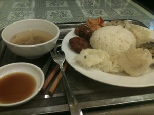 What you can get there for 30.000 VND : com suat or set rice. at Loving Hut - Chua Lang in Hanoi