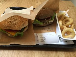 The 'cheezy' burger, 'samourai' burger and vegan calamares (fried 'squid') at Loving Hut Veganerie in Leuven