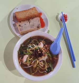 Prawn noodle and carrot cake.
Photo by Sam Lama at He Hua Vegetarian 荷花素食 in Central Singapore