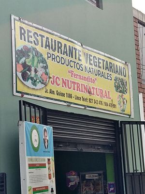 Exterior sign above the door at JC Nutri Natural in Lima
