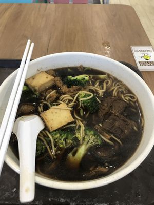 Close-up view of herbal noodle soup.  at Xuan Miao Veggie Food 炫妙 - PLQ Mall in Central Singapore
