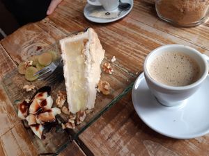 A piece of apple pie + cortado w/ oat milk at AbonaVida in Madrid