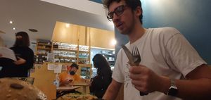 Charlie enjoying his musaka at Mama Tierra in Athens