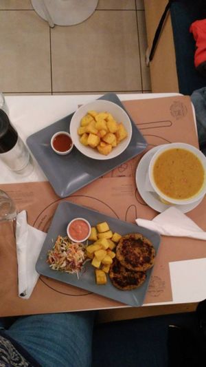 Eating tasty vegan food  at Mama Tierra in Athens