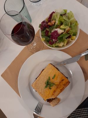 Moussaka, side salad, red wine. Had to dive straight in. at Mama Tierra in Athens