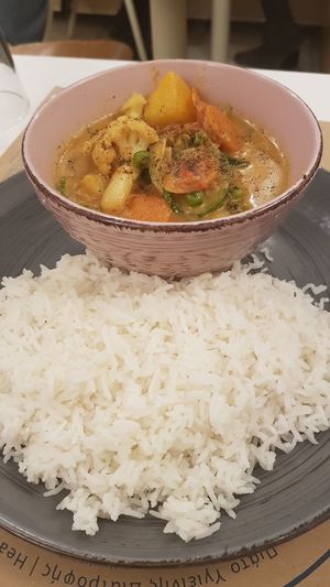 vegetables in coconut milk sauce, rice at Mama Tierra in Athens