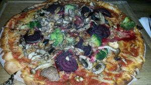 VEGAN PIZZA - TOMATO, BROCCOLI, MUSHROOM, THYME, WALNUT, BEETROOT at The Herb Garden in Newcastle Upon Tyne