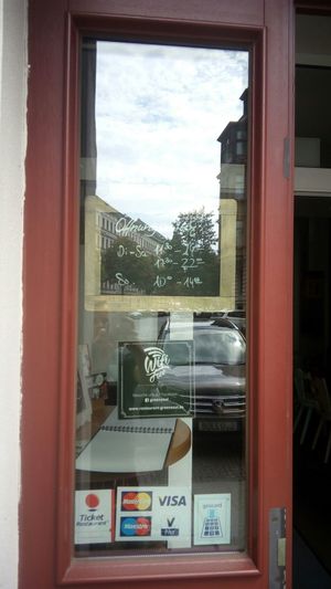 Opening hours (btw almost unreadable part says 14 pm) at GreenSoul in Leipzig