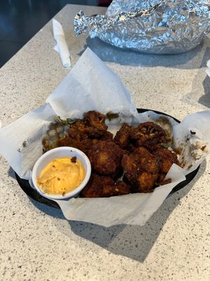 The cauliflower wings with aioli sauce are so good. Must try.  at The Wheelhouse in Springfield
