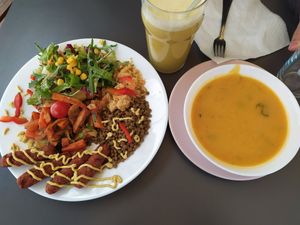 Salad with vegan chevapi, lentil soup and fresh ginger juice at Priroda i Drustvo in Rijeka