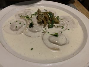 Artichoke stuffed ravioli in pumpkin seed sauce  at Teresa Carles Cocina Vegetariana in Barcelona