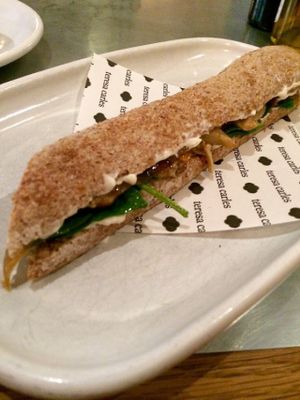 Whole wheat flute with mushroom, whipped vegan truffle mayonnaise, and spinach (vegan breakfast item). at Teresa Carles Cocina Vegetariana in Barcelona
