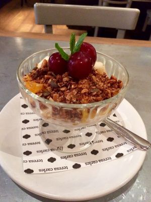 Fresh fruit and raw granola soya yogurt parfait (vegan breakfast item). at Teresa Carles Cocina Vegetariana in Barcelona