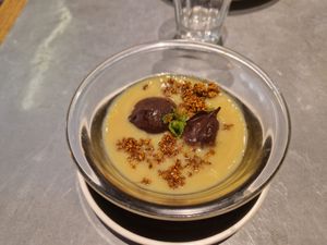 Bombons de figues farcides de nous sobre crema anglesa at Teresa Carles Cocina Vegetariana in Barcelona