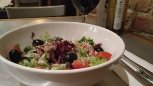 Salad with spirulina and vegan cheese at Teresa Carles Cocina Vegetariana in Barcelona