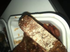 HEAVILY MOULDY BREAD. Within the white patch is a black spore SO STRONG DISGUSTING
~ NO REFUND ISSUED 
~ JUST FOBBED OFF GENUINE COMPLAINT ORDERED CALI MOULDYBREAKFAST at Anna Loka in Cardiff