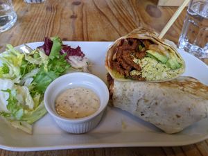 bacon and tofu scramble wrap with avocado added at Anna Loka in Cardiff