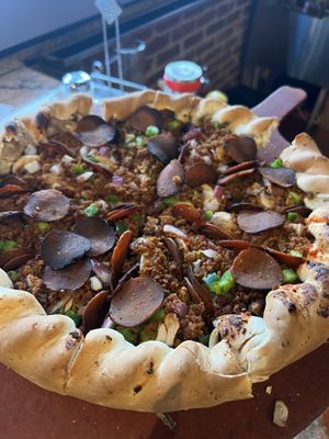 Cheese-less vegan meat combo pizza. It came out looking a lil burnt and dry and not great but was actually surprisingly flavorful and wonderful! I especially loved their pepperoni  at Beau Jo's in Fort Collins