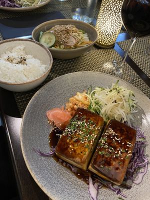 Pan seared tofu with teriyaki sauce, pickled vegetables, served with rice and green salad  at Hoku in Helsinki