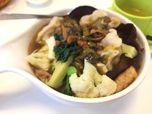 Spicy and sour soup noodles with assorted vegetable and mushroom at O and S in Kowloon