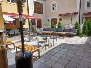 Outdoors seating area in the back at Legume in Uppsala