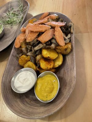 Champi papas with sausages  at El Jardín de Jazmín in Lima