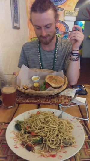 burger and pasta at El Jardín de Jazmín in Lima