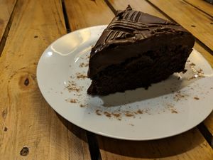 Chocolate cake with chocolate coconut frosting. at El Jardín de Jazmín in Lima