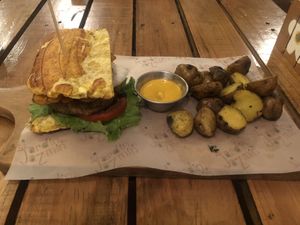 Veggie burger with potatoes  at El Jardín de Jazmín in Lima