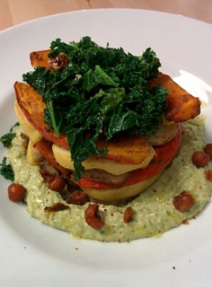 roasted pumpkin, eggplant, potato and apple on savory hummus with kale and fig salad on top. excellent! at Zyzna in Wroclaw