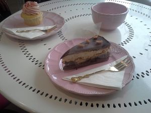 Berry cupcake and Snickers cake at NomNom Vegan Bakery in Vienna