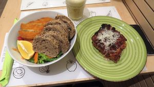 lasagna, freshly prepared juice, salad milanese at Universo Vegano in Florence