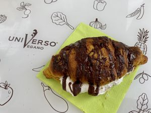 Chocolate croissant filled with cream 😋  at Universo Vegano in Florence