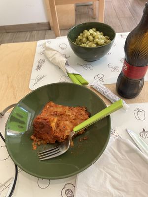 Microwaved, dry, bland and mushy lasagna and the gnocchi with a weird consistency…   at Universo Vegano in Florence
