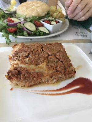 Lasagna with a soy ragú, oily, soggy, blend  at Universo Vegano in Florence