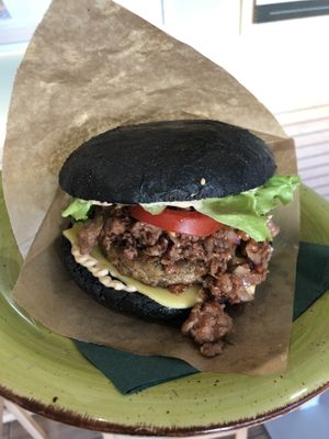 Smoked burger! So good! Huge and messy! at Universo Vegano in Florence