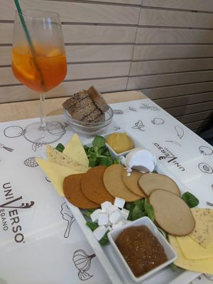 Spritz & vegan meat & cheese platter with dijon mustard and apricot chutney at Universo Vegano in Florence
