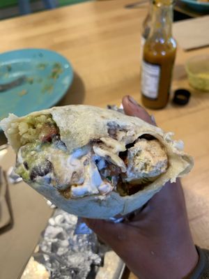 Tempeh royale burrito sub tofu with vegan sour cream  at Laughing Planet Cafe in Bend