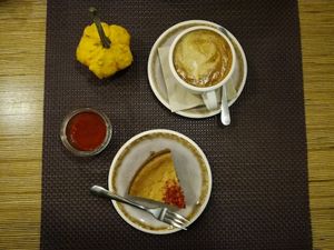 Cake and cappuccino we ordered at Bhajan Cafe in Riga