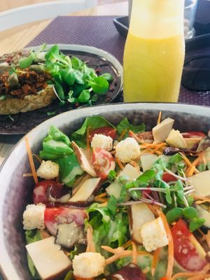 Salad with smoked salad and mango lassi 🥭🥗 at Bhajan Cafe in Riga