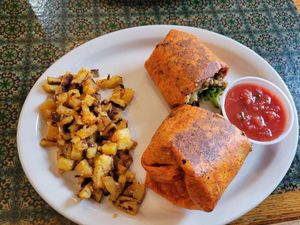 Breakfast burrito and potatoes at 3 Sisters' Cafe in Indianapolis