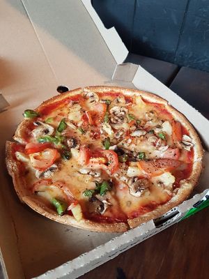 Pizza with vegan cheese at Hell Pizza in Rotorua