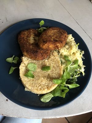 Cauliflower patties with quinoa and pickled vegetables.  at Korzenie  in Lodz