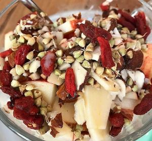 Goji berry and apple granola with almond milk at Naspolya Nassolda in Budapest