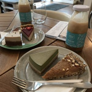 A selection of cakes and cold brew coffee at Naspolya Nassolda in Budapest