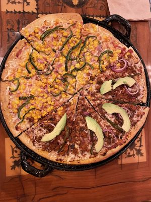 Hawaii and Mexican pizza  at U.to.pi.a in Mexico City