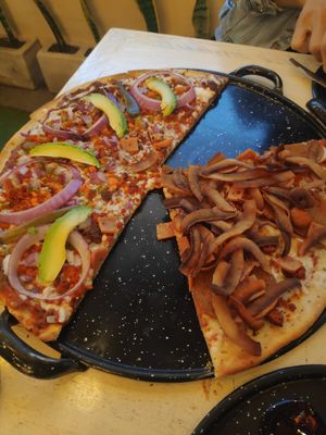 Mexican and meat lovers half and half at U.to.pi.a in Mexico City