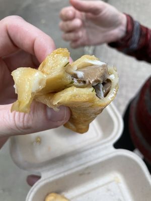 Mixed mushroom empanada with vegan cheese  at U.to.pi.a in Mexico City