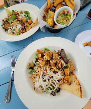 Vegan Thai bowl and plantains with guacamole. at Indigo Coastal Shanty in Brunswick